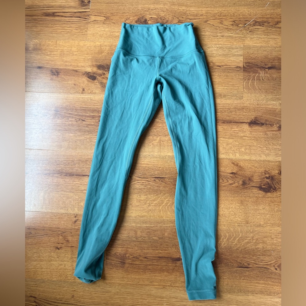 Lululemon leggings 

Aligns 25” in a sea foam green color
